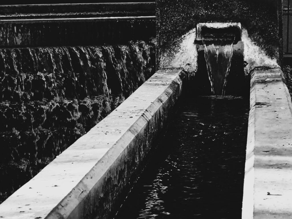 Descending Water black and white photograph by Inci Jones